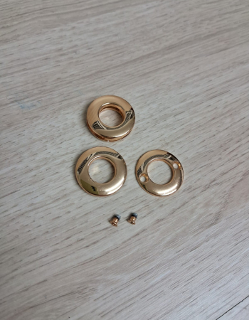 imagem ILHÓS PARAFUSO DOURADO